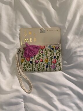 Sol and Mer Floral Beaded Wristlet in Ivory with Pink Tassel